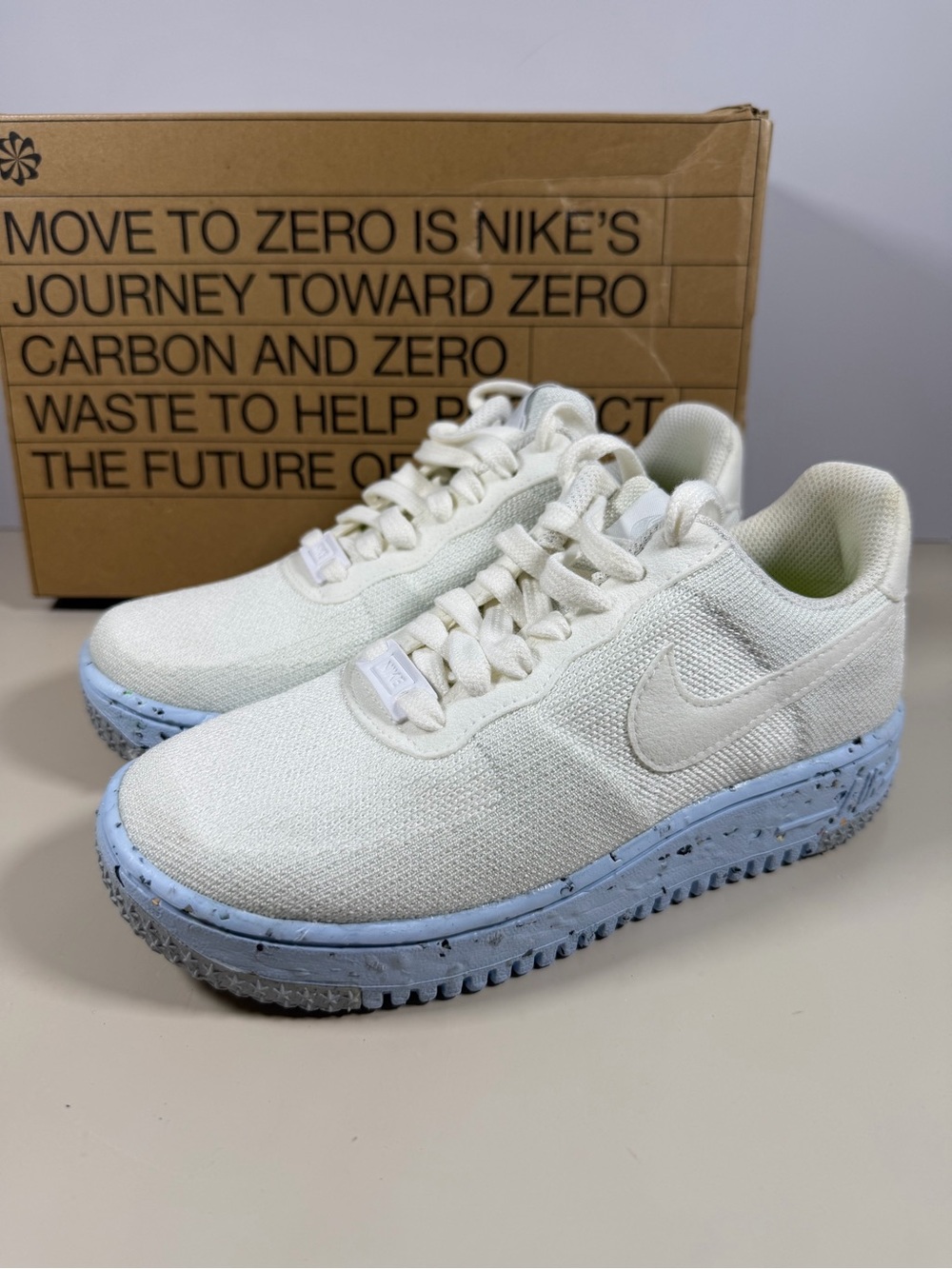 Nike Kids White Sneakers with Light Blue Speckled Sole